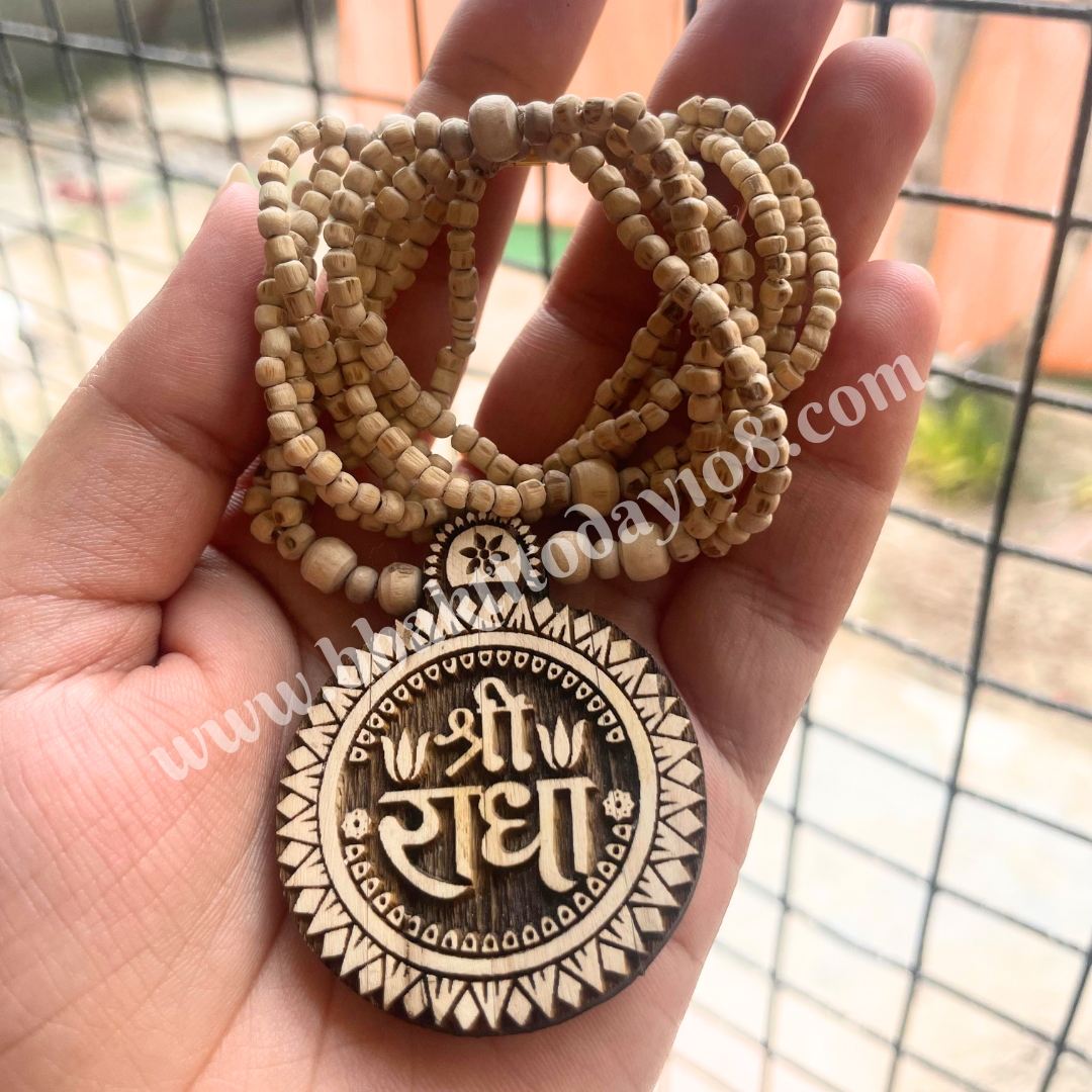 Shri Radha Tulsi Necklace featuring sacred Tulsi beads and a Radha name pendant, symbolizing devotion and divine grace in Vaishnava tradition.