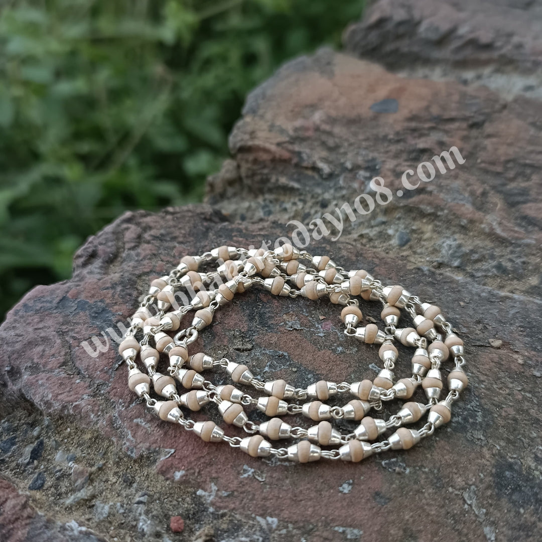 Sterling silver chain featuring small, round Tulsi seed beads.