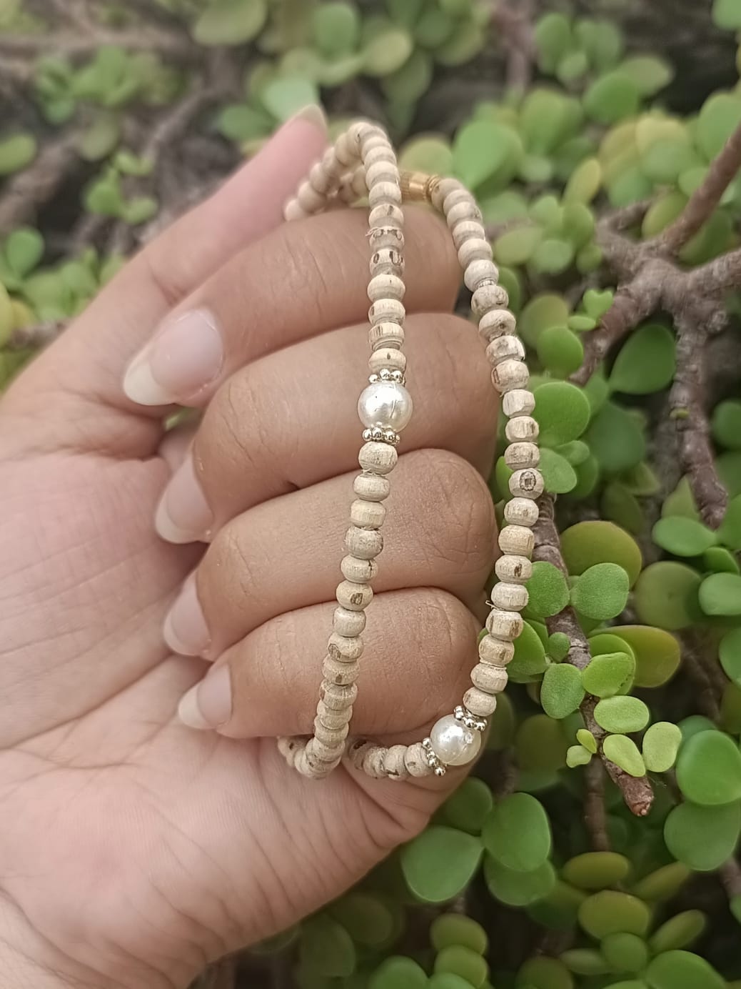 Classic Pearl Pure Tulsi Mala, handcrafted with authentic Tulsi beads and high-quality pearls by Brijwasis in Vrindavan. A perfect blend of devotion and elegance, ideal for meditation, prayer, and gifting.