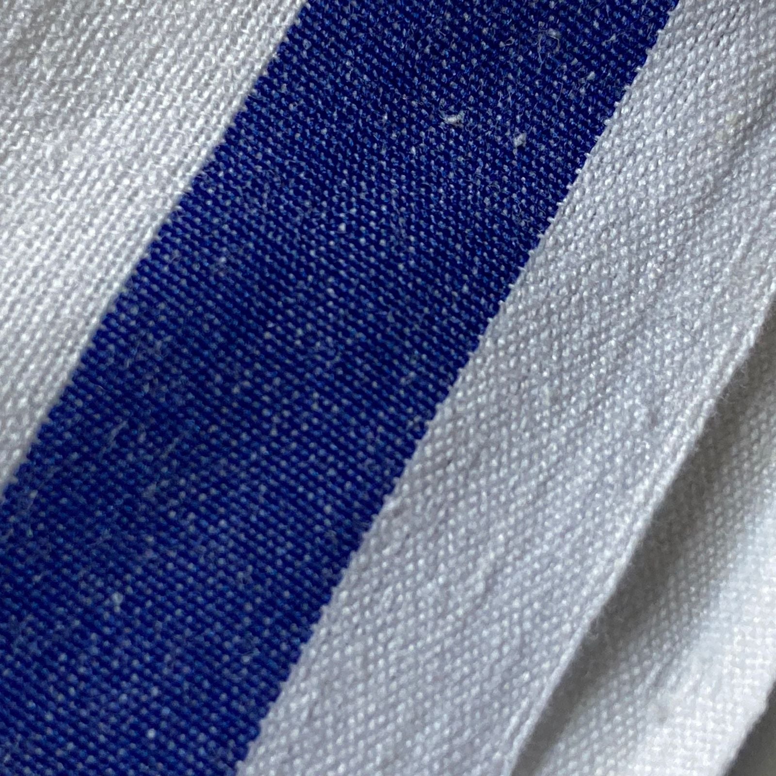 Traditional men's cotton dhoti made from soft, breathable fabric, featuring a simple and elegant design ideal for religious ceremonies, festivals, or everyday ethnic wear.